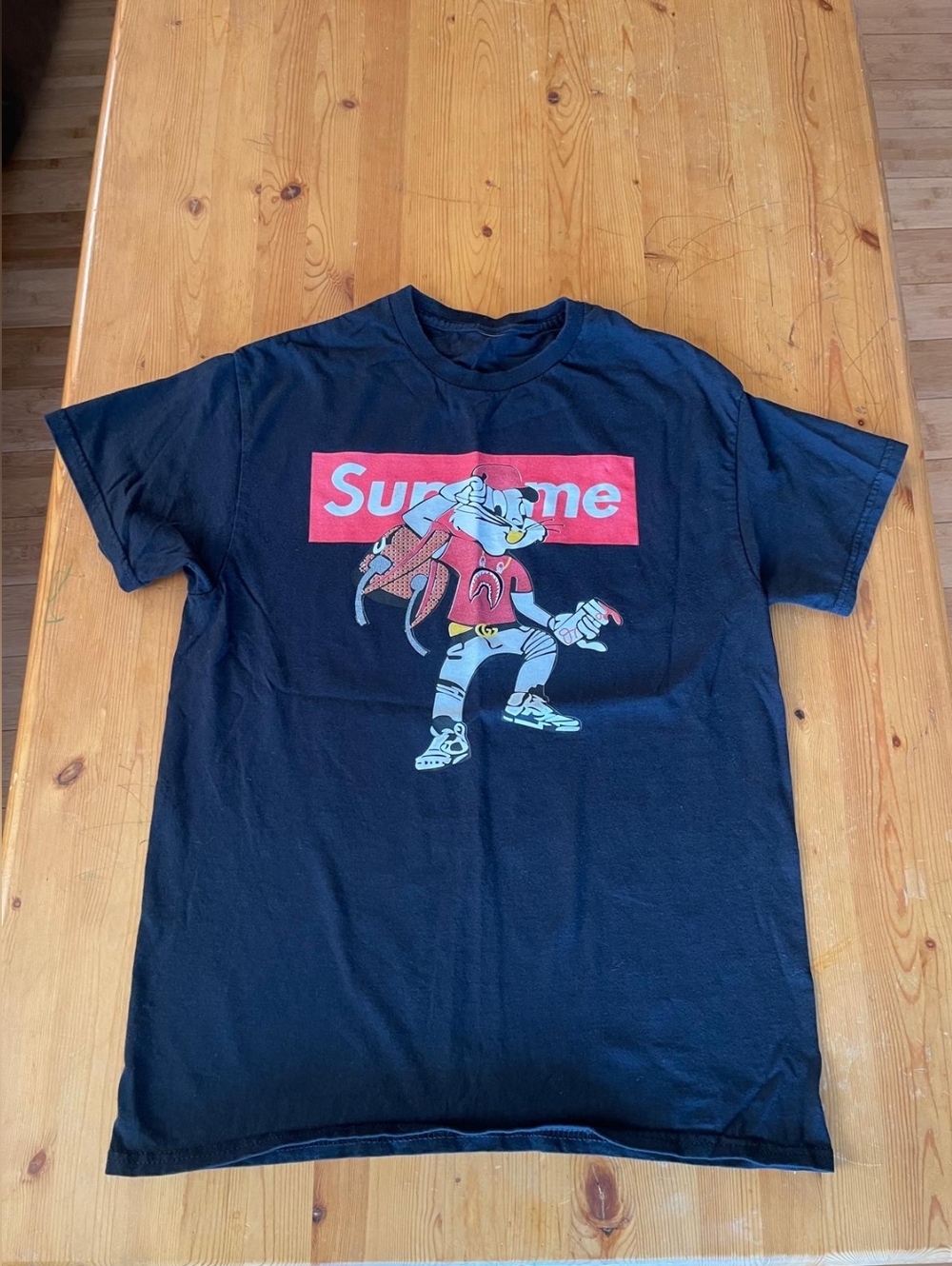 Supreme Black Tee with Red Logo and Multicolor Graphic